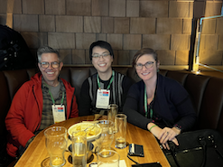 Eli, Waldan, and Kasie eat