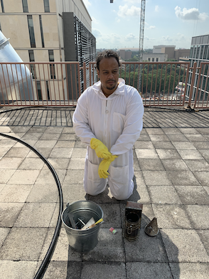 Photo of Alan E.S.C. in a beesuit