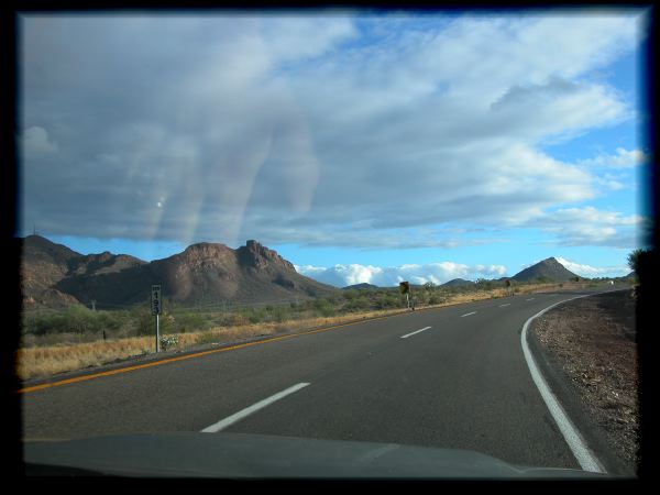 Sonoran road with hand